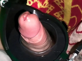 A jerk-off robot tests the stamina of a large penis. asian careless nude sex videos